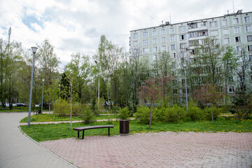 Residential building, bench in the yard