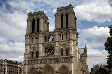 Fototapeta na wymiar View of Notre Dame Cathedral in Paris. Towering, 13th-century cathedral with flying buttresses & gargoyles, setting for Hugo's novel.