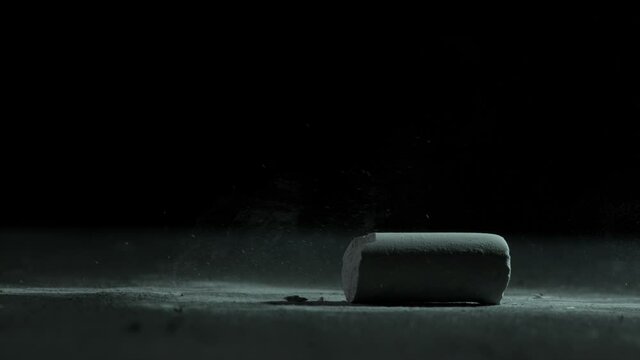 High speed Slow Motion Chalk falling down on ground and breaking