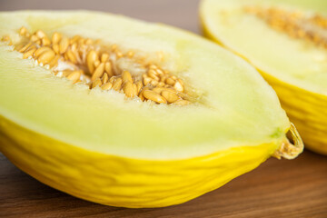 Yellow melon on a wooden table
