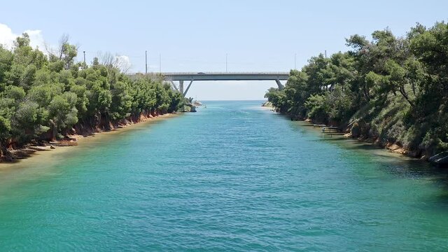 Drone footage of Nea Potidea canal, which connects Toroneos Bay with the Gulf of Thermaikos. Greece, Kassandra, Halkidiki