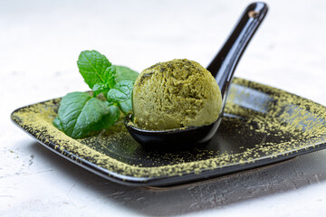 Green tea and ice cream. Trendy Japanese dessert.