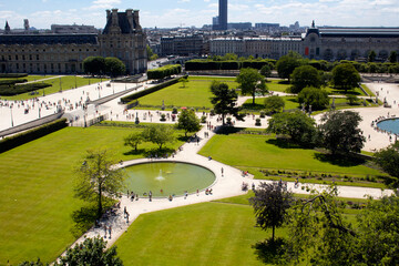Aerial view of Jardin Des Tuileries and Paris cityscape. Expansive, 17th-century formal garden...