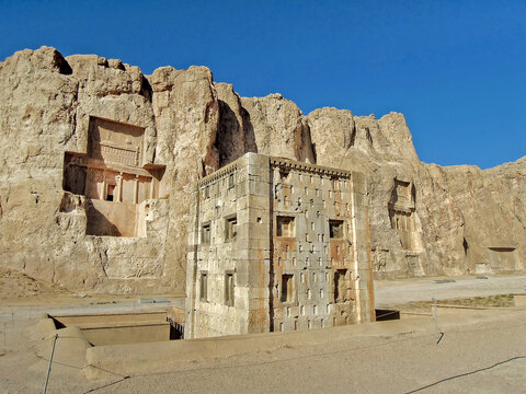 Cube of Zoroaster or Ka'ba-ye Zartosht located in Naqsh-e Rustam, rock necropolis of Persian kings. On background are royal tombs of Persian kings. Marvdasht, near Persepolis and Shiraz, Iran
