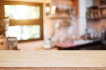 Empty desk space platform over blurred restaurant or coffee shop background for product display montage.