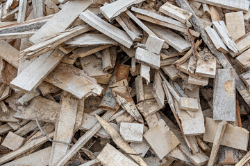 Texture, a pile of garbage from woodworking waste. Cutting boards, shavings, sliver.