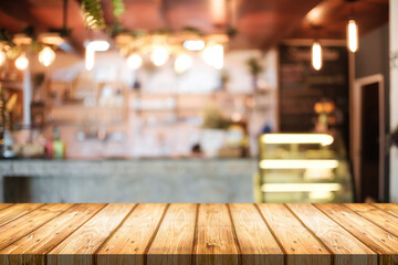 Empty wooden desk space platform and blurred resturant or coffee shop background for product display montage.