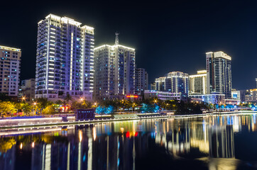 Fototapeta na wymiar Night panorama view of Sanya city on Hainan island, China