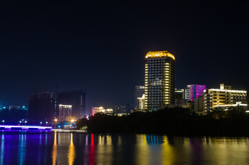 Fototapeta na wymiar Night panorama view of Sanya city on Hainan island, China