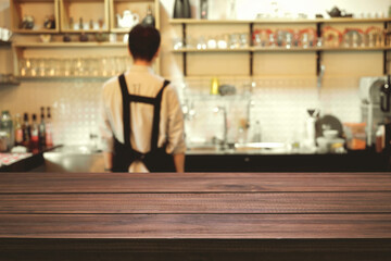 Empty wooden table space platform and blurred resturant or coffee shop background for product display montage.