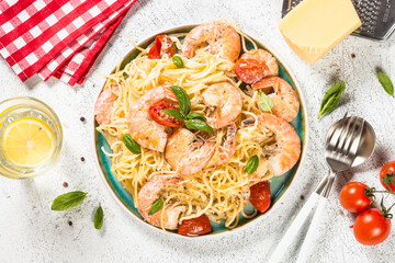 Pasta seafood with shrimp on white table.