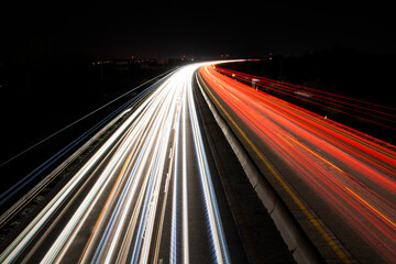 Fototapeta na wymiar light trails on highway at night, long exposure photo