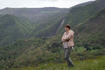 Woman enjoy the mountain valley
