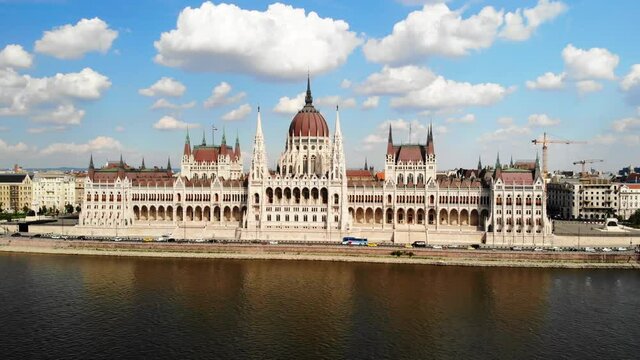 Budapest, Hunagry. Drone Aerial View of Parliament Building by Danube River and Traffic on Riverside Road