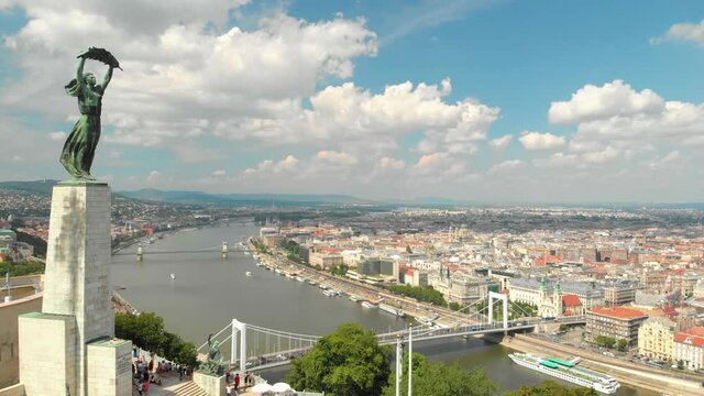 Budapest, Hungary. Drone Aerial View of Liberty Statue and Danube River From Gellert Hill on Sunny Summer Day