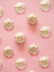 Garlic pattern on pink background
