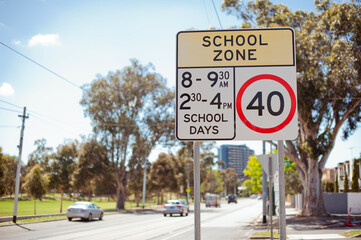 Road sign school zone. Australia, Melbourne. City street.