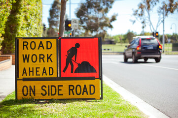 Road work sign. Australia, Melbourne. City street.