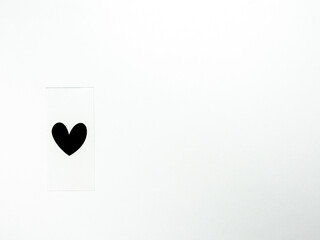 Black heart against white background