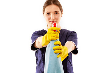 Young woman in apron isolated on white background. Cleaning concept