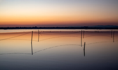 A series of landscapes of a salt lake in a seaside resort after sunset. Magic colors. Contemplation.		Pomorie resort, Bulgaria.
