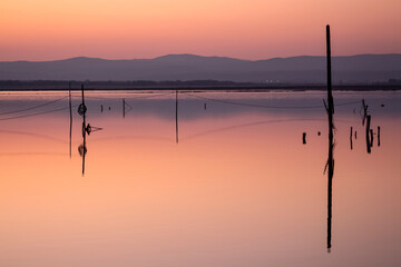 A series of landscapes of a salt lake in a seaside resort after sunset. Contemplation. Pomorie resort, Bulgaria.