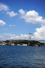 Obraz premium Bosphorus bridge in Istanbul, blue sky and sea