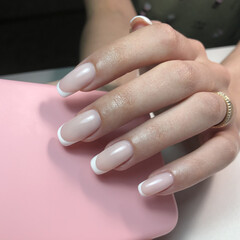 French manicure on the nails. French manicure design. Manicure gel nail polish