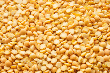 Dried split peas background. Focus all over the frame.