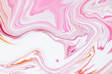 Fluid art texture. Abstract backdrop with iridescent paint effect. Liquid acrylic picture with flows and splashes. Mixed paints for background or poster. Pink, coral and golden overflowing colors
