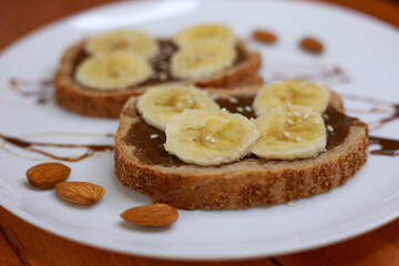 healthy dessert with chocolate paste and bananas