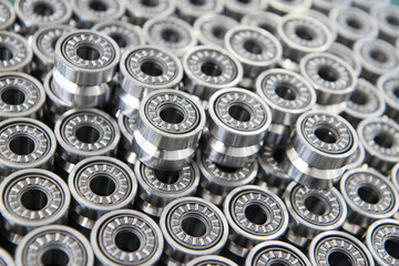 Close up on ball bearings lined up.