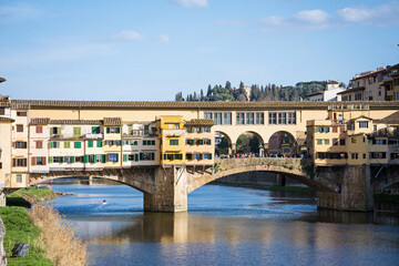 Fototapeta na wymiar View of medieval stone bridge Ponte Vecchio on the Arno river in Florence, Tuscany. Italy