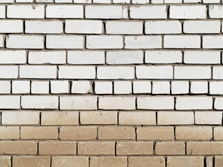 Abstract background old white brick wall with cracks and scratches. Landscape style. Great background or texture.