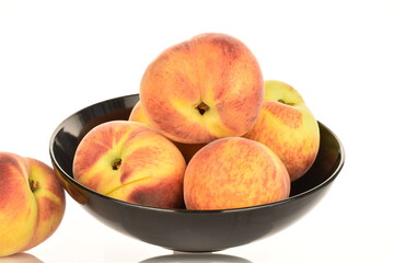 Ripe organic peach, close-up, on a white background