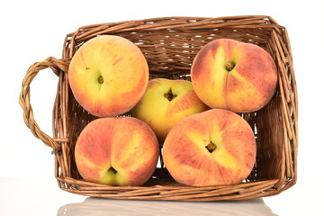 Ripe organic peach, close-up, on a white background