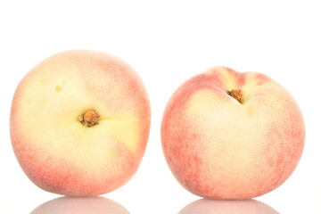 Ripe organic peach, close-up, on a white background
