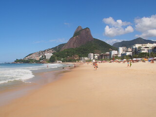 Rio de Janeiro, Brazil - 08/03/2020: Sunny day on the coast of the Atlantic ocean, Ipanema beach