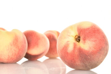 Ripe organic peach, close-up, on a white background