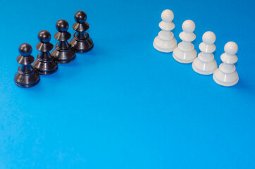 Black and white chess pieces on a blue background. Stop racism. Black lives matter! Motivational...
