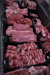 Showcase of a butcher's shop. Close-up. Pork.  Fresh.