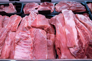 Showcase of a butcher's shop. Close-up. Pork.  Fresh.