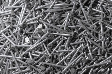 Metal Nails. Texture. Many new long iron nails. Background for wallpaper.