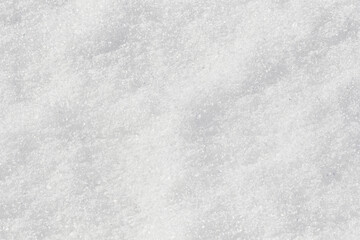 White snow surface background - top view of fresh snow texture on the ground