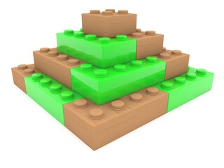 Green toy bricks in a wooden pyramid