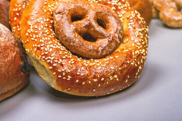 Fresh bread and bakery in the form of background, close-up and with selective focus