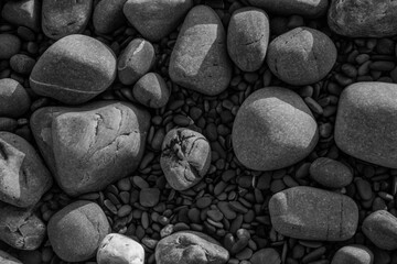 different sized pebbles on the beach