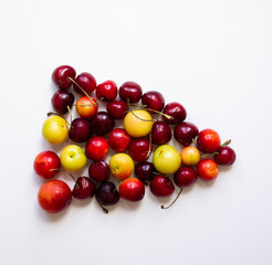 Cherries and plumps isolated on white background. Fresh. Nature.	