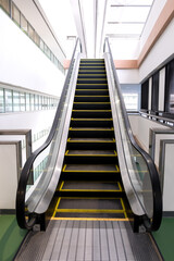 Single escalator for customer service in public building.