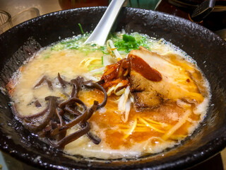 Close up of traditional Kumamoto style Tonkotsu ramen with Char siu in bowl